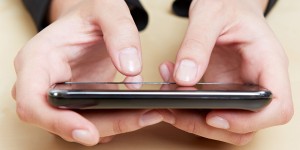 fingers-on-smartphone-300x150